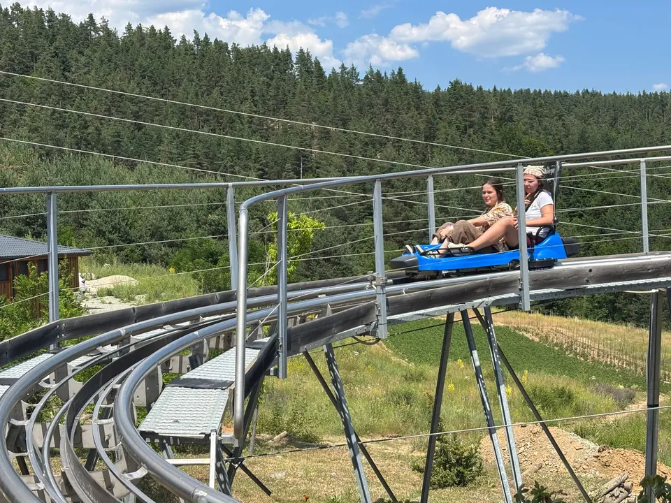Guests on the Rila Fun Park mountain coaster.