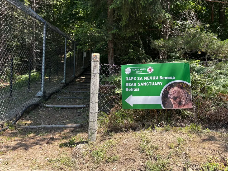 Bear Park sanctuary sign beside the fenced entrance path.