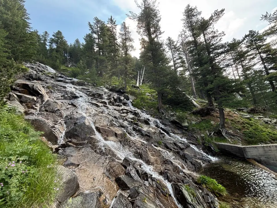 Water spreading across the sloping rock at Karaalanitsa cascade.