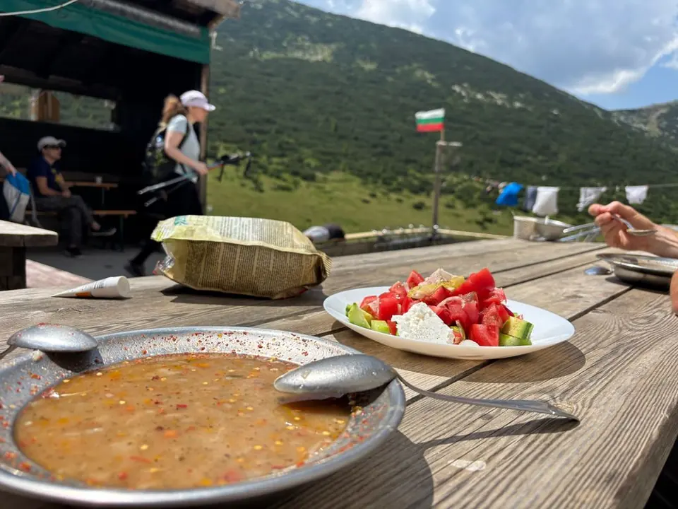 Soup and salad at an outdoor table at Macedonia Hut.