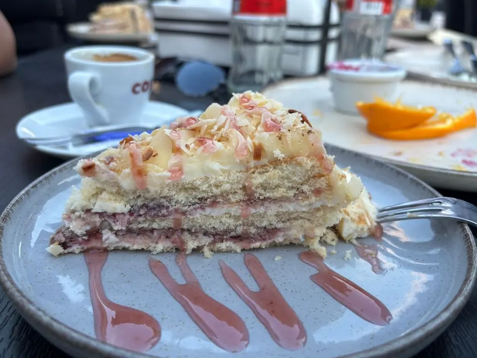 Cake and coffee at Vision Bar & Dinner in Belitsa.